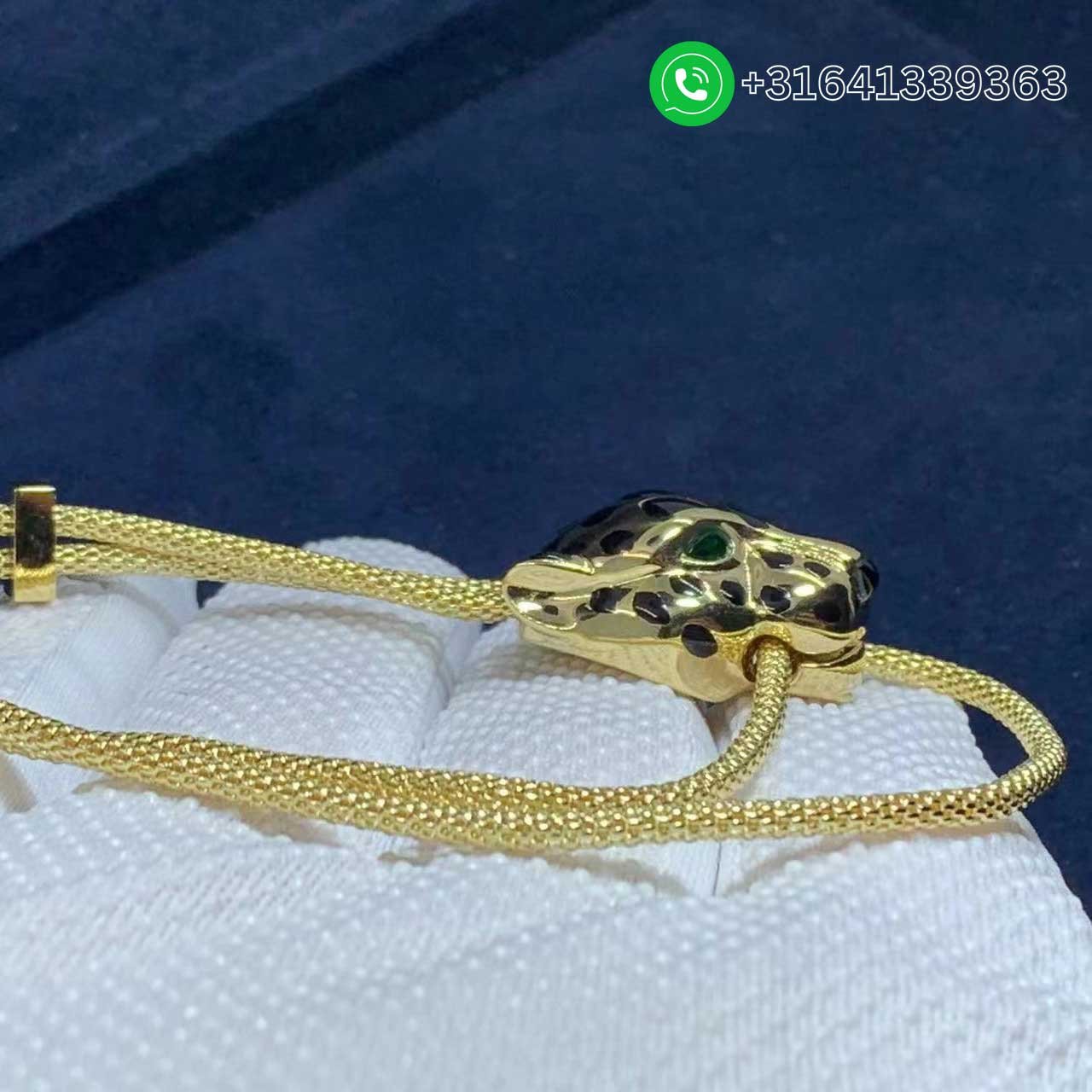 18k-Yellow-Gold-2-Tsavorite-Garnets-Onyx-Panthere-de-Cartier-and-Diamond-Bracelet-N6700517-9